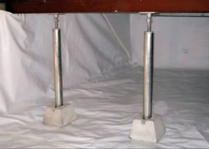 A  Woodbridge crawl space support system repairing a sagging structure.