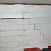 A buckling foundation wall in a Herndon home.