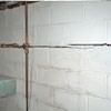 Severe foundation damage from a long crack in a bucking wall of a Leesburg home.