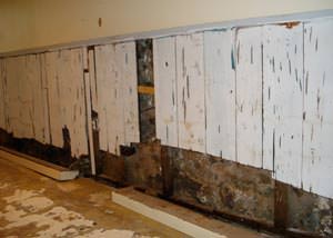 A wet, flooded finished basement in Bristow