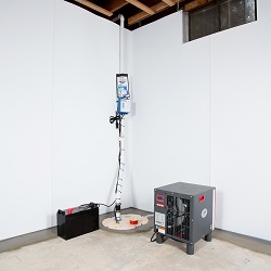 Sump pump system, dehumidifier, and basement wall panels installed during a sump pump installation in Leesburg
